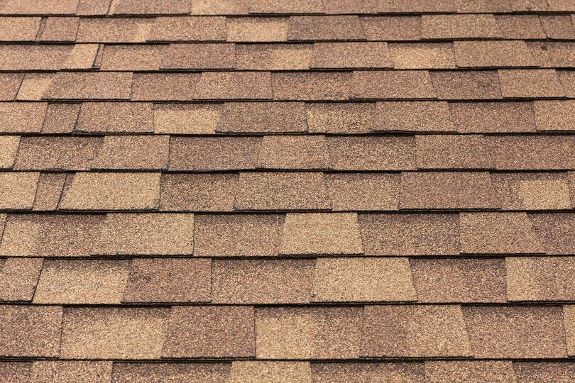 Close-up of a brown architectural shingle roof