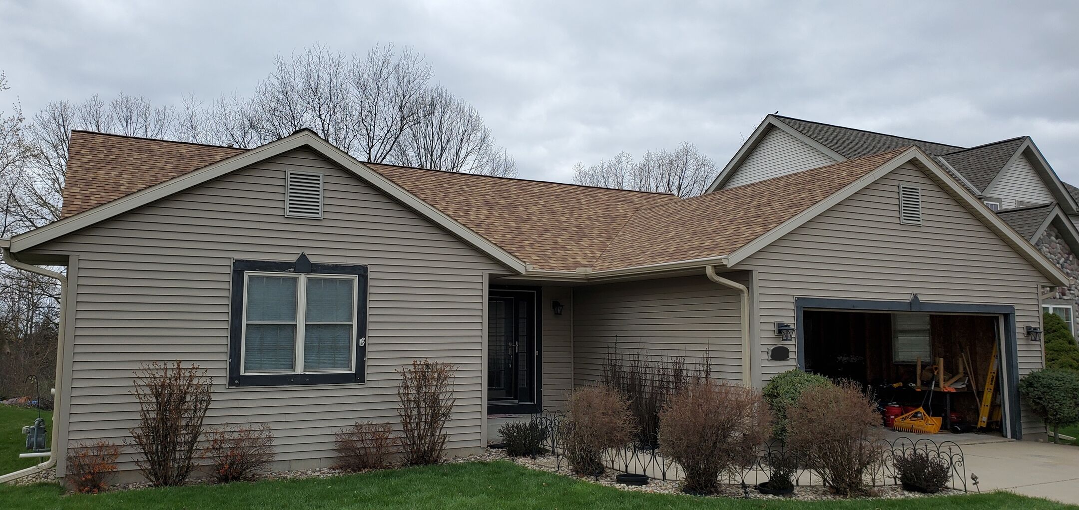 stone tudor split rail fence roofing project